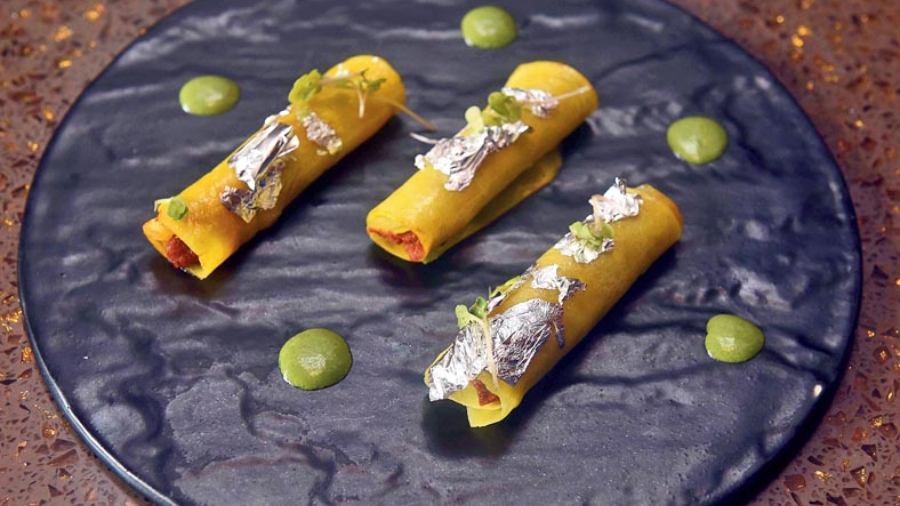 Mutton Galouti, Sheermal Cannelloni: A must-try from the menu, this unique dish balances spice and sweet perfectly. These bite-sized cannelloni are soft, aromatic and covered with edible silver foil that adds to the grandeur of the dish.