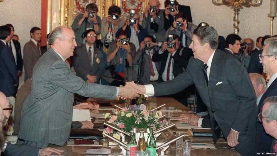 On December 8, 1987, then US President Ronald Reagan (R) and Gorbachev signed the US-Soviet nuclear arms treaty in Washington, D.C. The final treaty eliminated an entire class of nuclear weapons, restricting the deployment of both intermediate and short-range land-based missiles worldwide