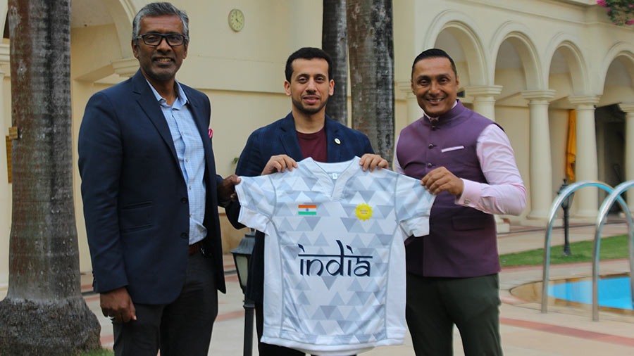 Gerald Prabhu, secretary of Rugby India (left), poses with Al Dhalai and Bose displaying the jersey of the Indian rugby team