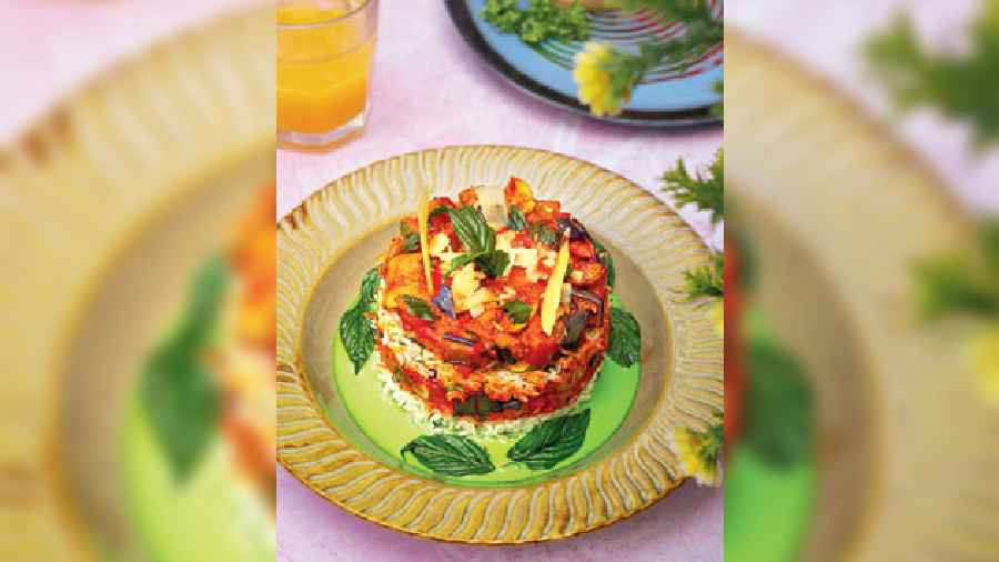 Tomato Eggplant Zucchini Ratatouille: This French dish, which garnered unprecedented attention worldwide after the release of the Disney film Ratatouille, consists of stewed vegetables like eggplant, zucchini, yellow squash, bell peppers, and fresh tomatoes, and aromatic garlic and herbs.