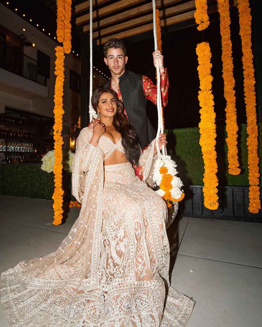 The duo celebrated their first Diwali in their first home in 2021. Priyanka wore a gorgeous white lehenga, while Nick opted for a colourful kurta paired with a black vest.  