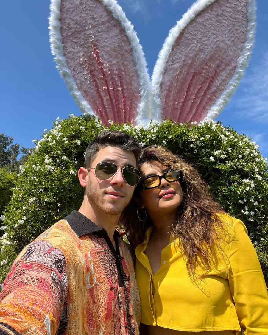 The cute couple have a funny bone. They posed with those bunny ears on Easter this year. 