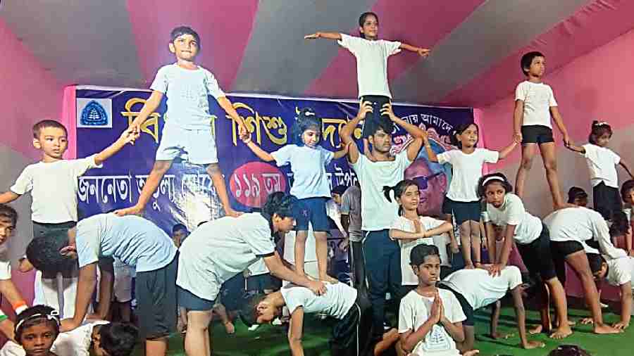 Young members demonstrate their yoga skills at the Atulya Ghosh birth anniversary programme at Bidhan Sishu Udyan 