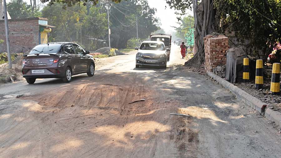 A battered and dusty Chaubhaga Road near the Chaubhaga Fish Market on Wednesday. 