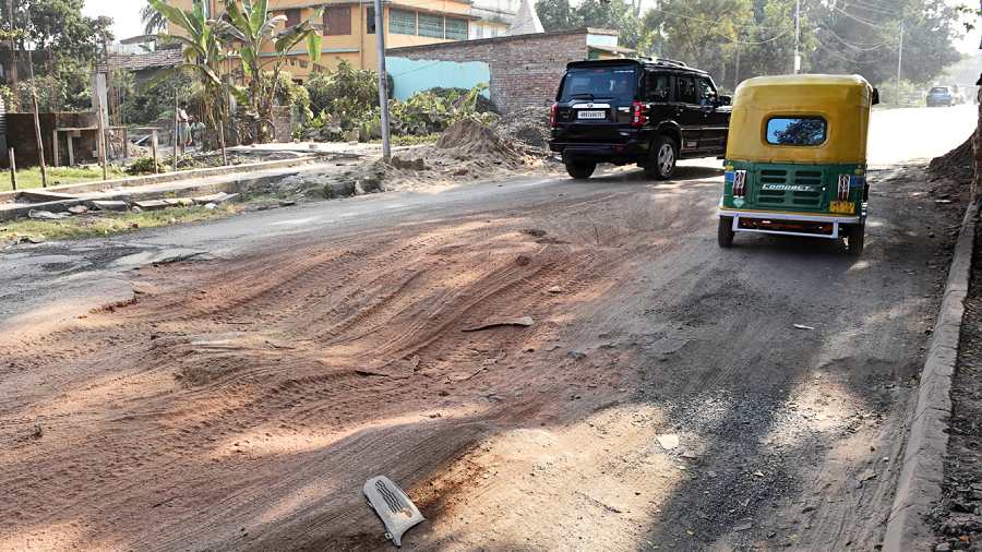 A battered stretch of Chaubhaga Road. The top layer has eroded, exposing the soil beneath. Battered roads are a source of air pollution, environment scientists say. Dust from the broken stretches hangs in the air, more so during winter.