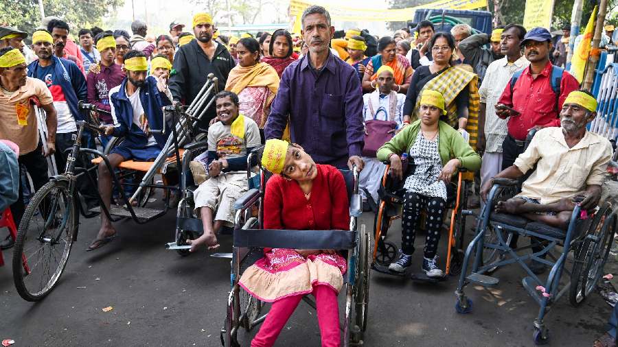 People with disabilities participate in a rally to mark International Day of Persons with Disabilities, in Calcutta. 