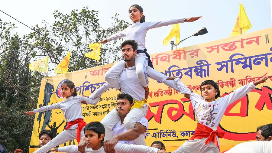 Student perform during a rally to mark International Day of Persons with Disabilities, in Calcutta. 