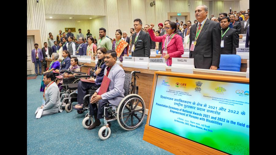 Awardees during the national anthem at the presentation of the event. 