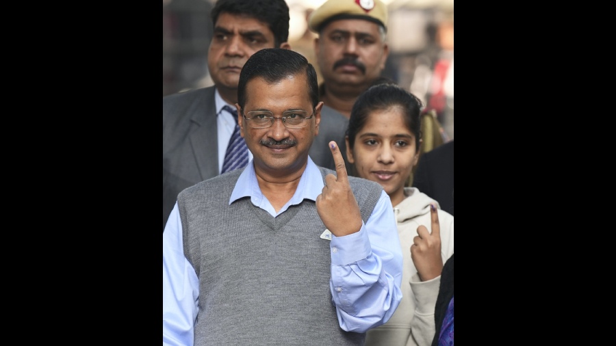 Delhi Chief Minister and AAP Convener Arvind Kejriwal shows his finger marked with indelible ink after casting his vote for the Municipal Corporation of Delhi elections, at a polling station in Civil Lines area, in New Delhi.