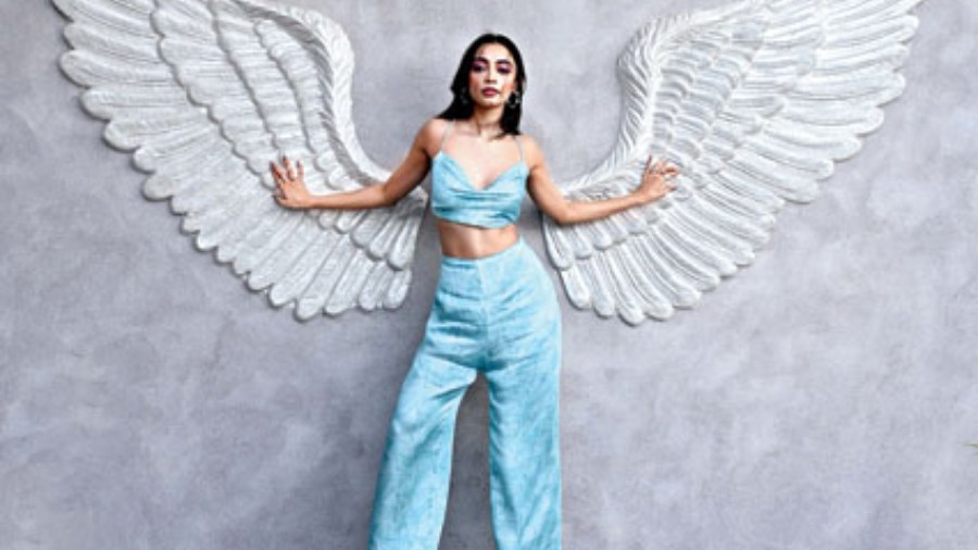 Diti’s look in the trendy co-ord set brings together two popular Y2K trends — the plunging cowl neck and flared pants. In a vibrant blue shade, this outfit from Avai is all about comfort from head to toe .