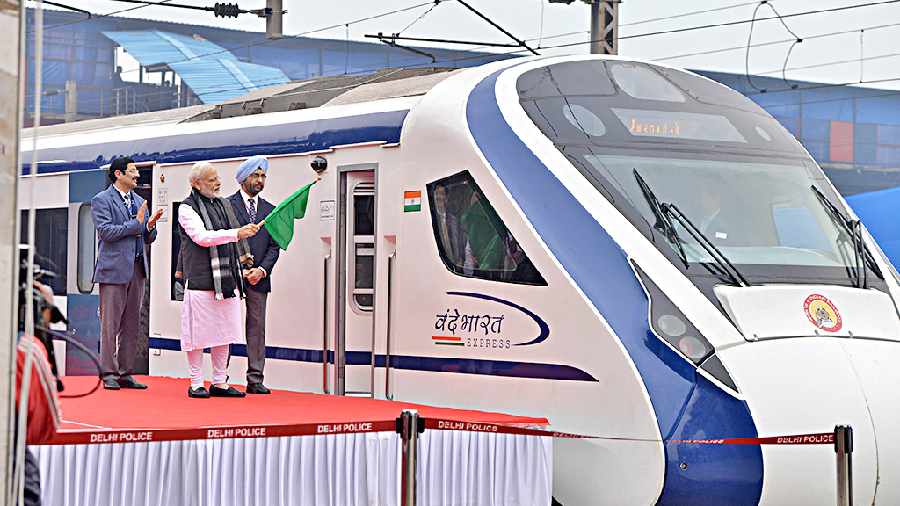Prime Minister Narendra Modi flags off a Vande Bharat Express at New Delhi railway station