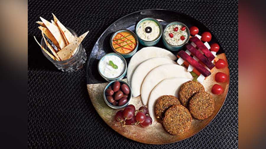 The Beirut Platter: A dip-heavy platter that has kalamata olives, labneh, hummus, muhammara and baba ghanoush, to be complemented with pita, falafel and lavash. The most wholesome dish on the menu that demands to be shared with the gang!