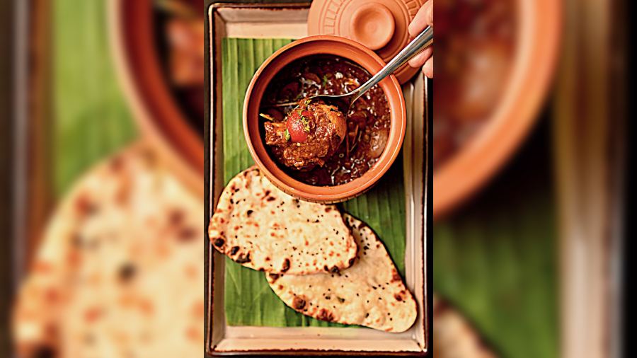 Champaran Gosht with Naan: This succulent chunks of mutton are cooked in a brown onion gravy and draw heavily on ingredients such as kalaunji, which is popular in Champaran, Bihar. The meat is tender and the bread has a melt-in-the- mouth feel.