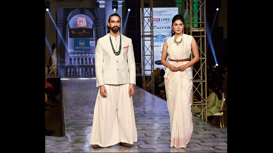 Neeraj Surana donned a linen bandhgala with threadwork and French knot detailing, teamed with cotton samurai pants. Sushmita Roy was  graceful in a custom handwoven Jamdani sari, paired with a lapel jacket featuring threadwork and leather panel detailing.