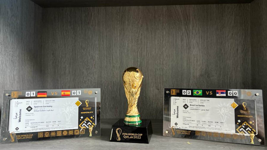 Framed tickets and a miniature trophy of the FIFA World Cup 2022 find place of pride in Avishek’s study room in Austin