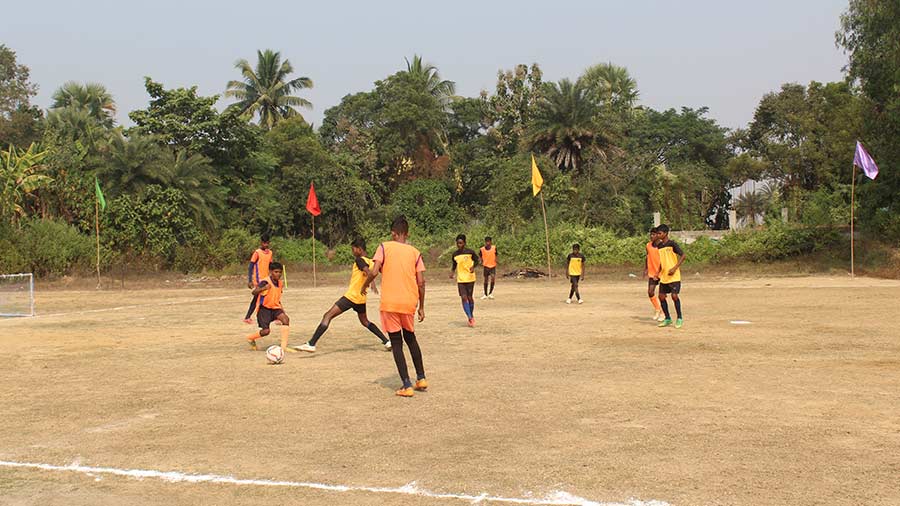 Sengupta’s students during a passage of quick, intense passing in a match