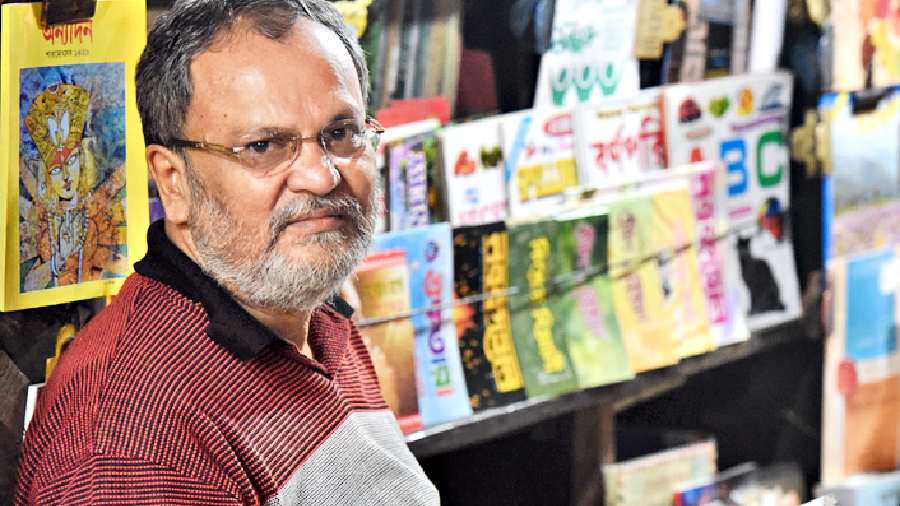 Kalyan Ghosh at his magazine stall near Kalighat Metro station