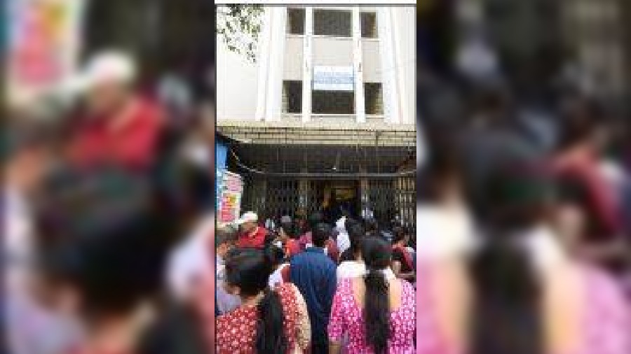 TET candidates enter Hindu School on Sunday morning to write the test