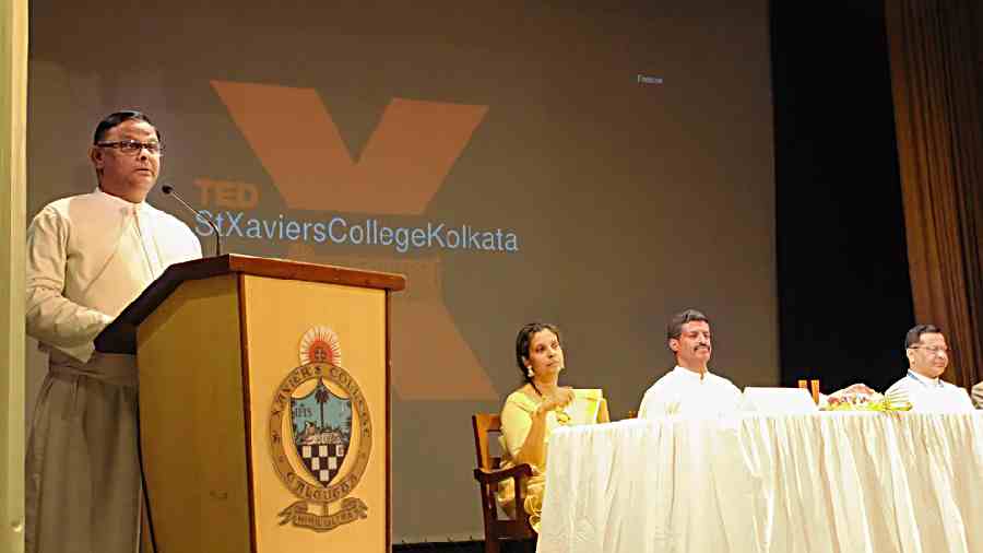 Father Dominic Savio, principal of St Xavier’s College, speaks at U-Connect