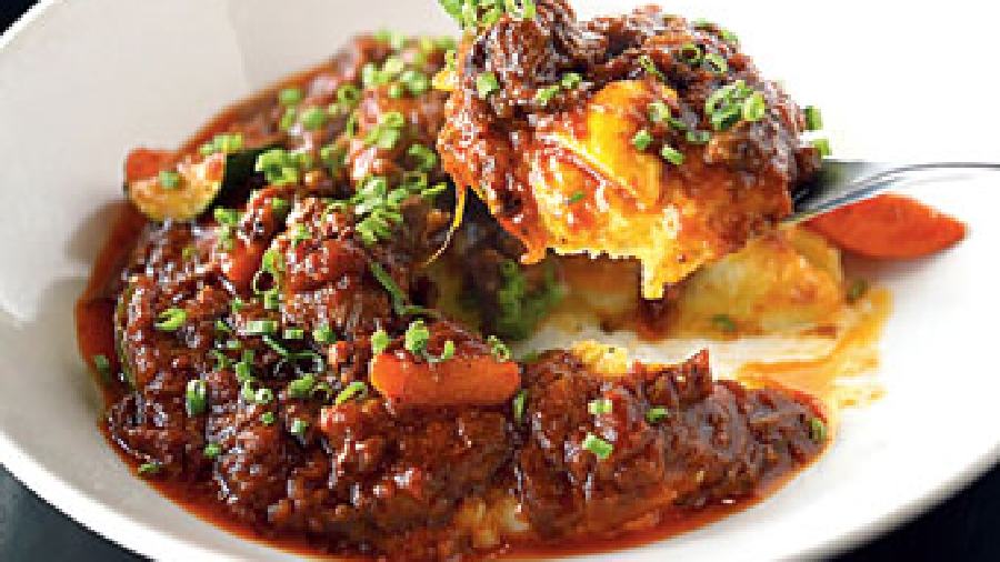 Paprika Braised Lamb, Creamy Mashed Potatoes: The lamb chunks are soft and juicy, the paprika gravy is the right pungent addition to the bed of creamy mashed potatoes.