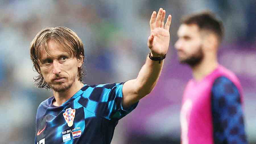 Luka Modric waves to supporters after the match as Croatia are eliminated from the World Cup.