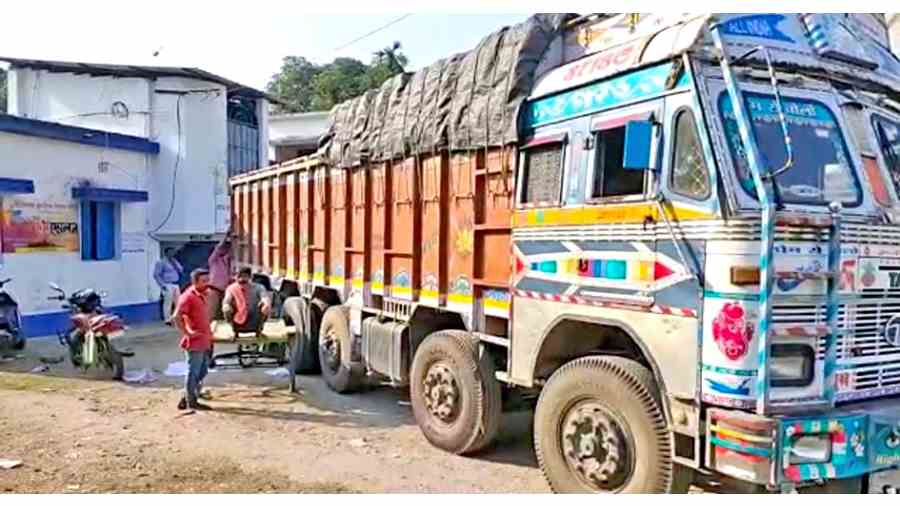 A truck loaded with textbooks in front of the godown of the district primary education department in Islampur on Tuesday