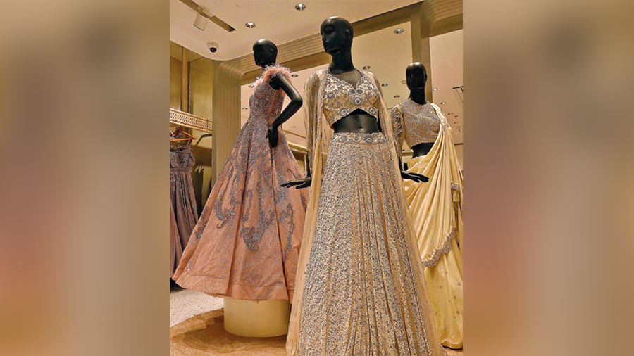 The gown and lehnga section on the second floor has a zone dedicated to the pastel palette, displaying trendy styles like draped outfits, fringe detailing and sheer cape detailing.