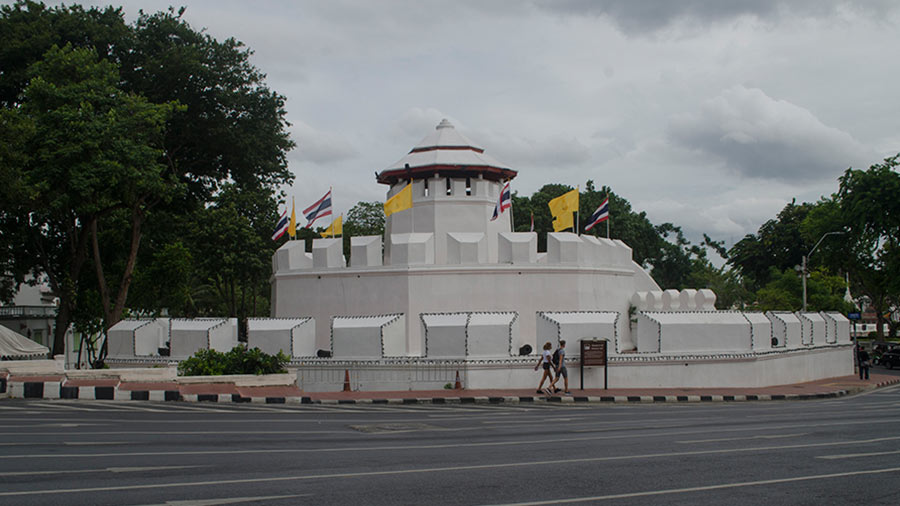 Mahakan Fort: Rama I (reign: 1782 – 1809) built a defensive wall along with 14 forts along the boundary of Rattanakosin Island. Today only two of these forts stand and Mahakan is one of them. It is located next to the ferry terminal that welcomes visitors to the Rattakosin Island. The polygonal fort has two sets of walls with battlement and is complete with a turret like structure. Cannons can be seen jutting out of the walls.  Entry inside the fort is prohibited