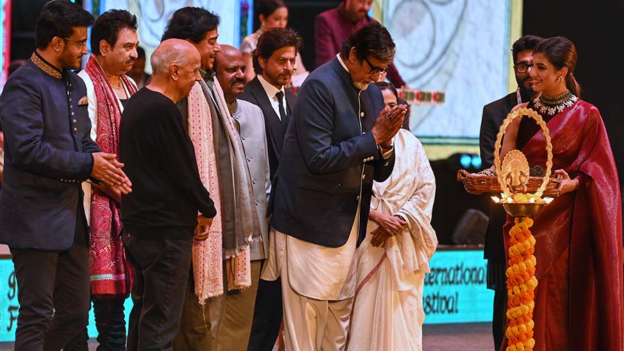 A star-studded lamp-lighting ceremony in progress at the inauguration of the 28th Kolkata International Film Festival (KIFF) at Netaji Indoor Stadium on Thursday. (From left) Former BCCI president, Sourav Ganguly, filmmaker Mahesh Bhatt, playback singer Kumar Sanu, veteran actor and TMC MP Shatrughan Sinha, West Bengal Governor, CV Ananda Bose, iconic actor Amitabh Bachchan, actor Shahrukh Khan and actor Rukmini Maitra. This year, as part of KIFF, 183 films, including 130 feature films and 52 short and documentary films from 42 countries will be screened for eight days till December 22. The films will be screened across 10 cinemas like Nandan 1, Nandan 2, Nandan 3, Rabindra Sadan, Sirir Mancha, Paschim Banga Bangla Akademi Sabhaghar, Radha Studio, Rabindra Okakura Bhavan, Nazrul Tirtha 1 and Nazrul Tirtha 2