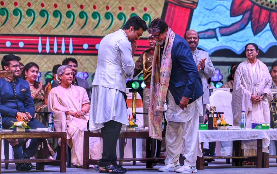 Tollywood actor and TMC MP, Dev Adhikari, greets Amitabh Bachchan during the inauguration
