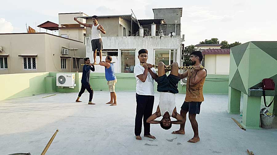 Inmates of Dum Dum correctional home rehearse on the roof of Chirantan Bhaduri’s house in CG Block.
