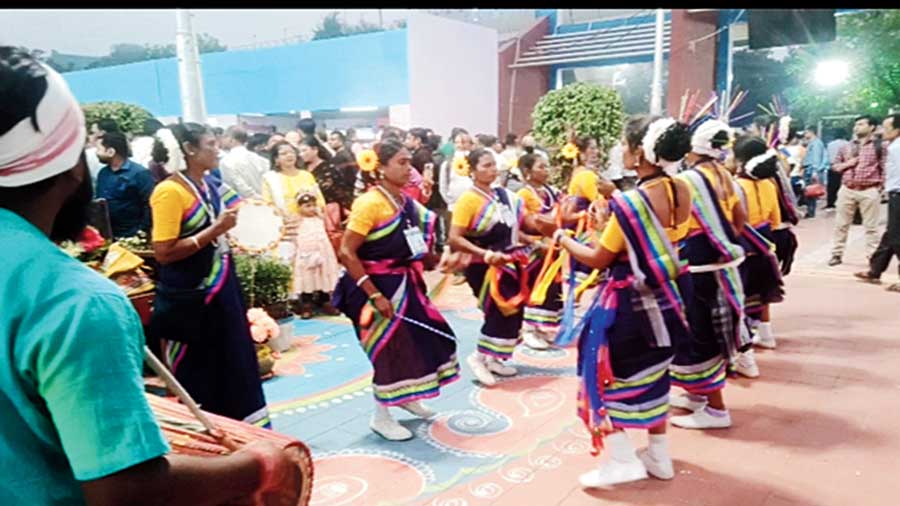 Tribal performers  present a dance routine.