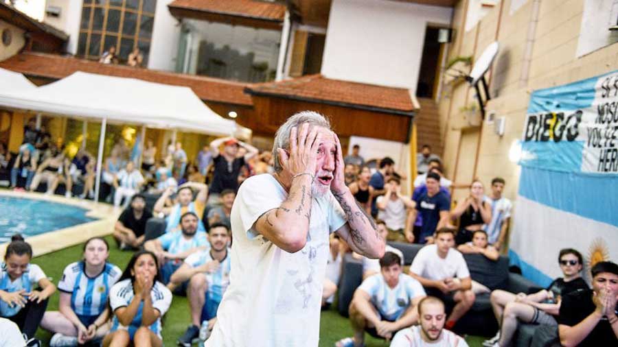 Fans at Maradona’s house in Buenos Aires on December 9, watching the World Cup match between Argentina and the Netherlands.