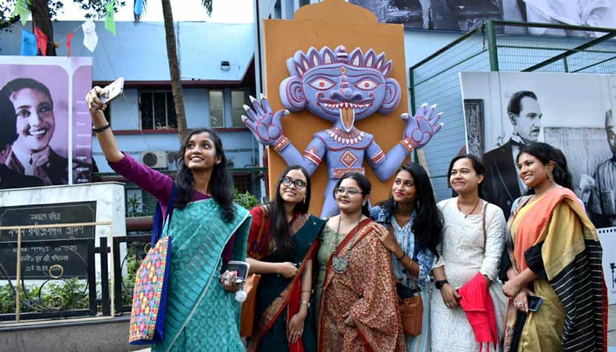 Cinegoers click selfies at the premises of Nandan on Friday
