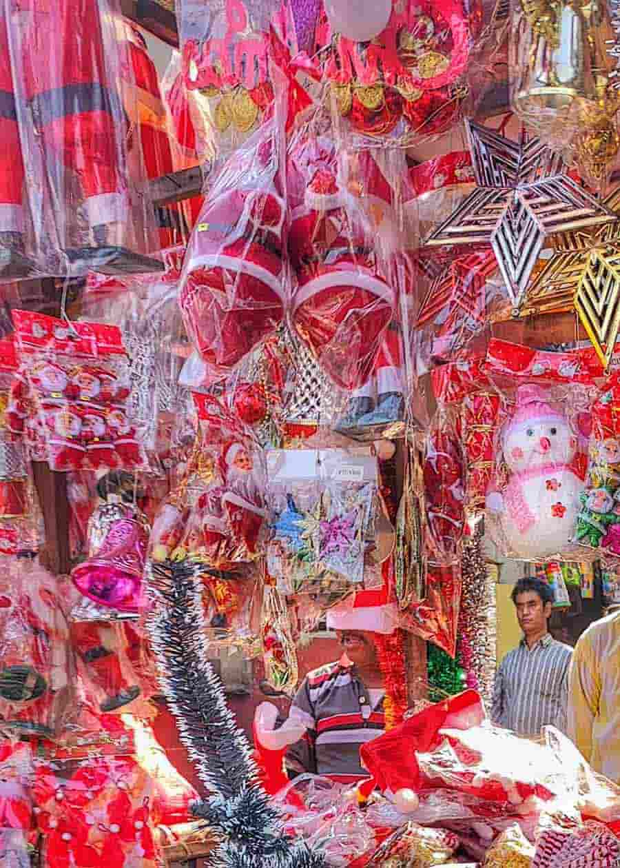 Stalls at north Kolkata decked up with Christmas items on Friday.      