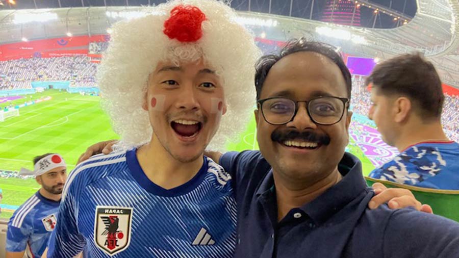 The author with a fan from Japan at one of the matches
