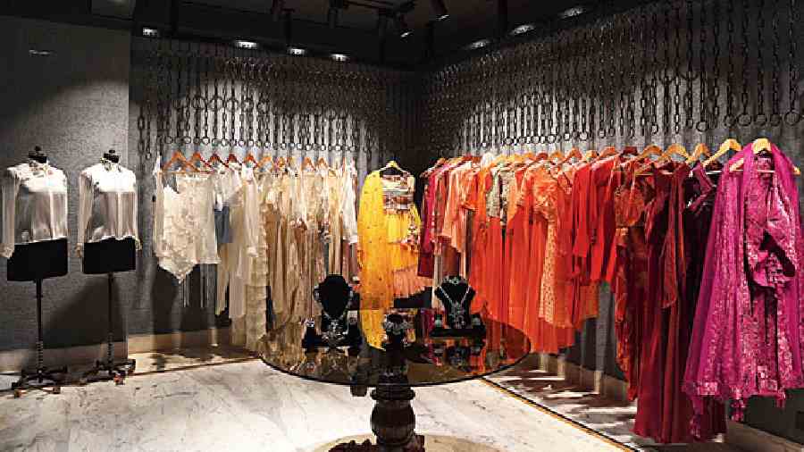 The interiors are dominated by a velvety-grey shade that helps in keeping the spotlight on the heroes of the store — the clothes. And a glimpse of the Western and Indo-western section that features gowns, dresses and lehngas shows the couturier’s finesse in the colour  spectrum.