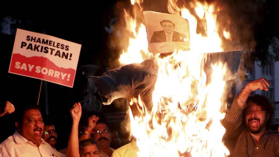 haratiya Janata Party leaders and supporters burn an effigy during a protest over Pakistan Foreign Minister Bilawal Bhutto's remarks against Prime Minister Narendra Modi