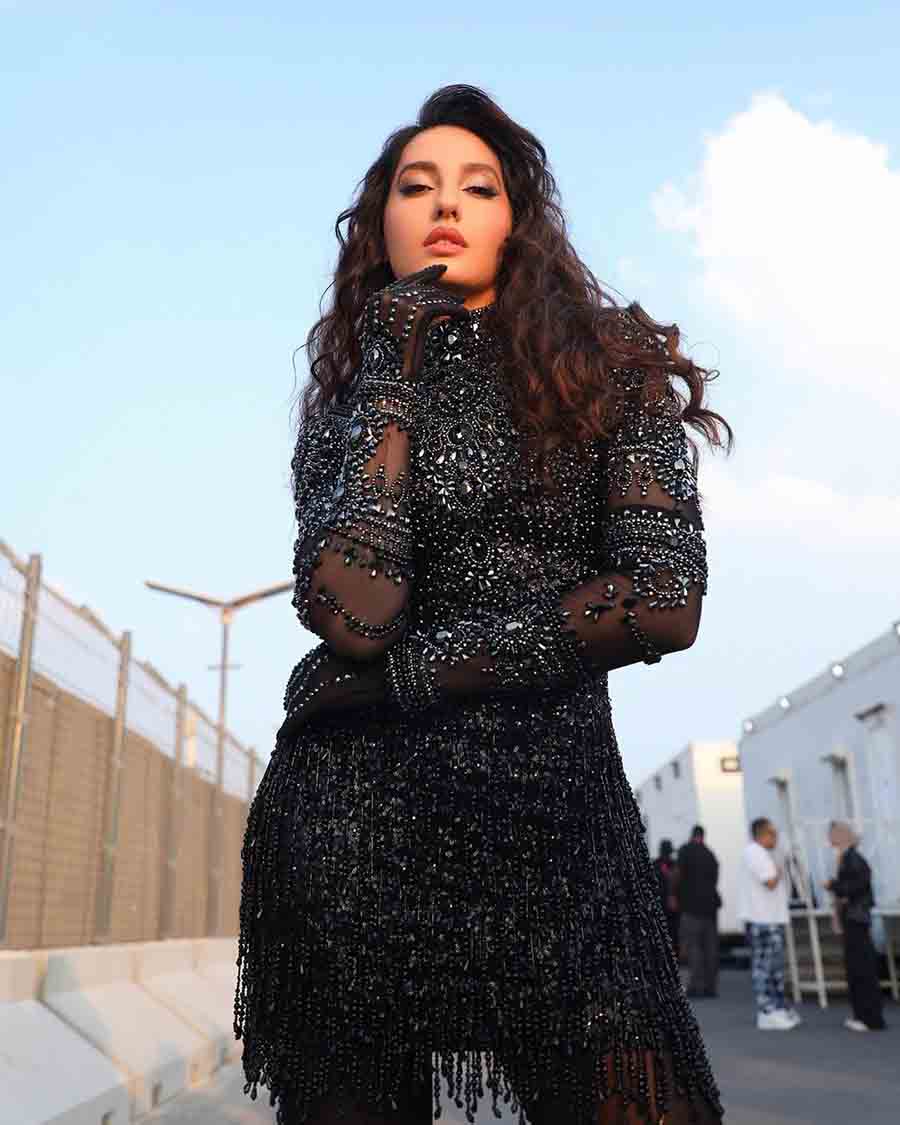 Nora Fatehi performed at the FIFA World Cup 2022 closing ceremony, dancing to the Haya Haya song in a shimmery black ensemble. 