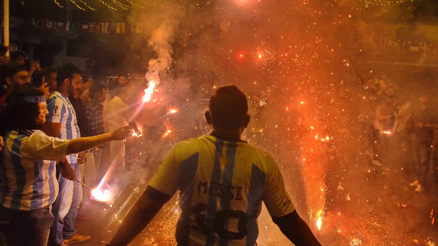 Fans bursting firecrackers after Argentina's penalty shootout FIFA win. 