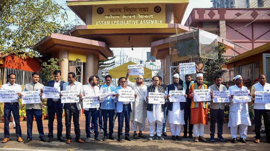 AIUDF MLAs stage a protest on the first day of Winter Session of Assam Legislative Assembly, in Guwahati, Tuesday, December 20, 2022. 