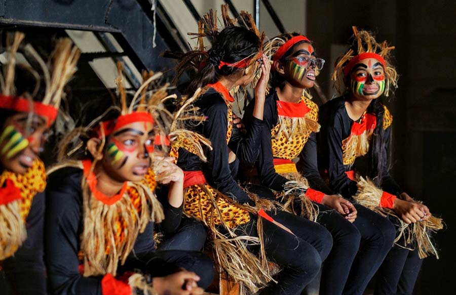 A glimpse of the backstage while the students were waiting to perform on Africa's Oshun Festival. We will represent an African tribal group. We are wearing faux animal skin and jute headgear,” said Adriya Paul of Class IX