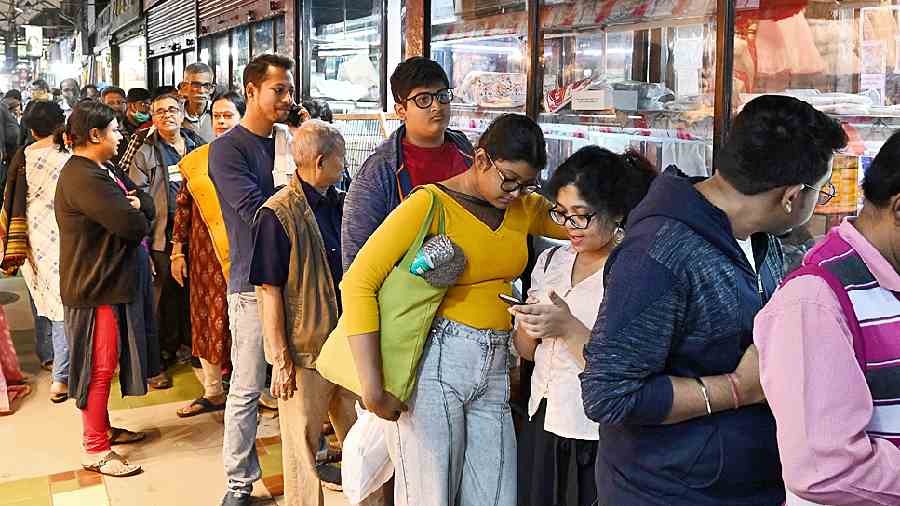 A queue of customers outside Nahoum’s at New Market on Thursday