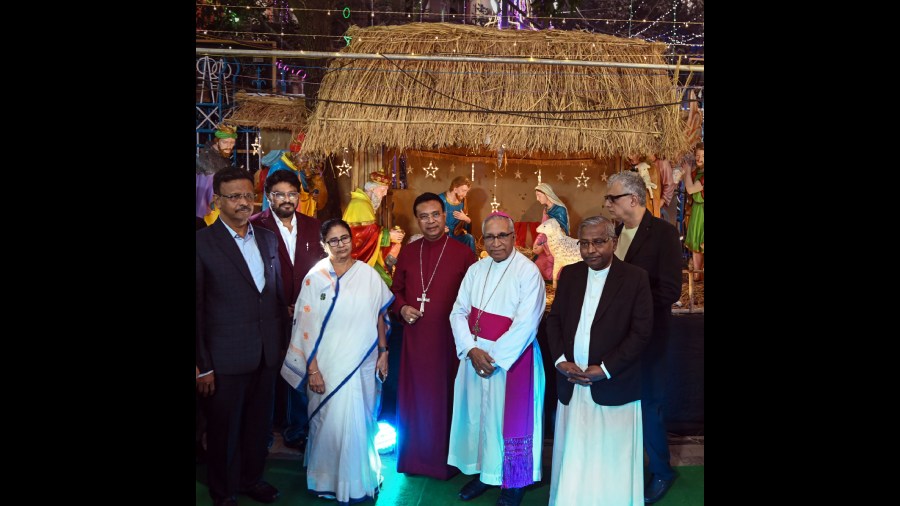  West Bengal Chief Minister Mamata Banerjee with Archbishop of Calcutta, Thomas D'Souza, State Tourism Minister Babul Supriyo and others during the inauguration of Christmas festival, in Calcutta. 