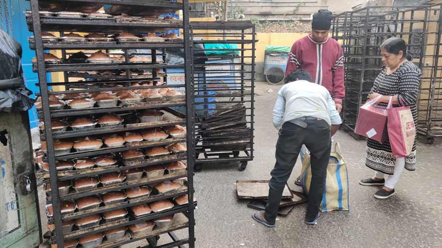 Cakes cooling on the rack outside Bimala Bakery