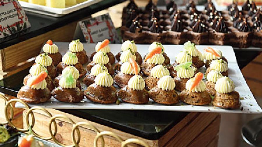 An array of delicious winter treats awaited the guests as they helped prepare the cake mix like the Pesto Macerated Young Tomato and Philadelphia Open Face Sandwich and the Carrot Cake with Mascarpone Swirl