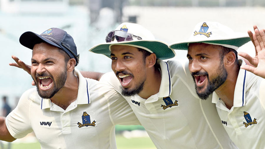 (From left) Bengal pacers Mukesh Kumar, Ishan Porel and Akash Deep celebrate a win during a match at Eden in March