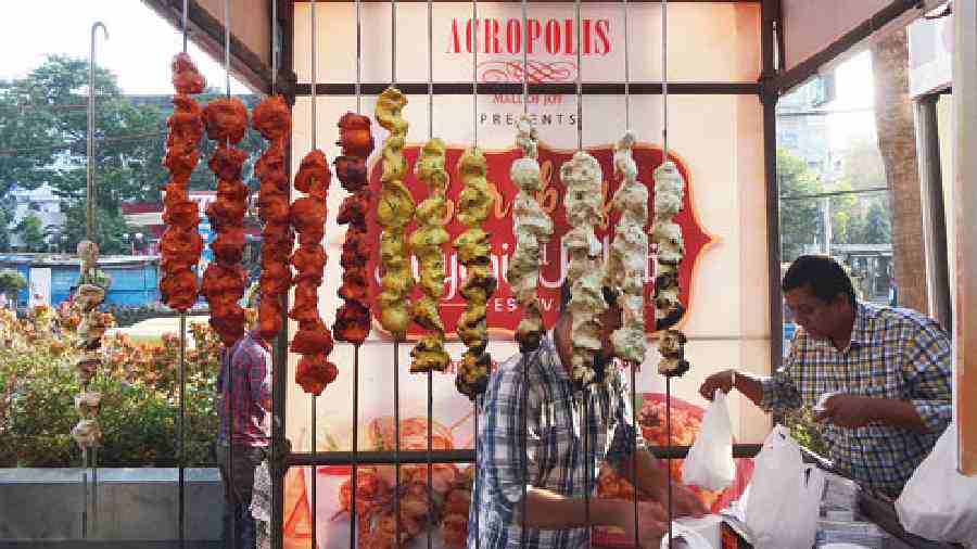 Ready to be cooked in the tandoor, the kebabs drew a big crowd