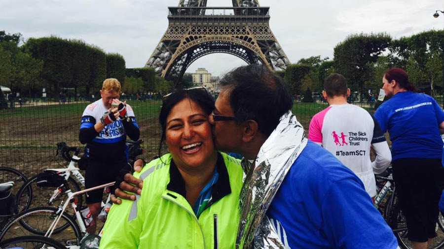 Dey and his wife (Suman) on reaching the Eiffel Tower at the end of their marathon cycle trip from London to Paris