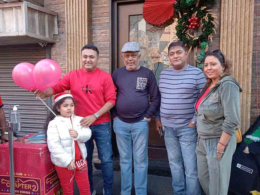 (L-R) The youngest member of the Chapter 2 family, Shanaya Chaudhury, enjoys the event with dad Debaditya, Debasish Kumar, uncle Shiladitya Chaudhury and a guest